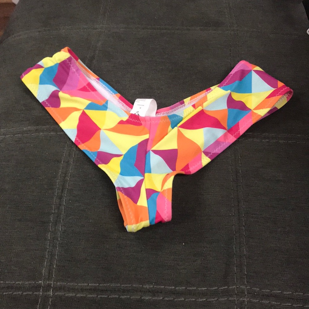 New never worn. V shaped cheeky bikini bottom.